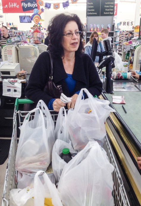 Madam in the Supermarket provisioning for the trip.