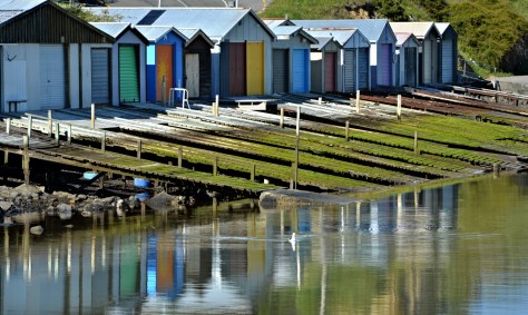 The colourful boatsheds at Duvachelle 