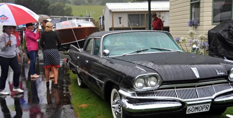 Shawn and Kathys Dodge with onlookers in the rain