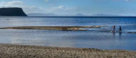 Kids playing on the lakefront
