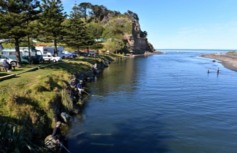 Whitebaiters enjoying the river