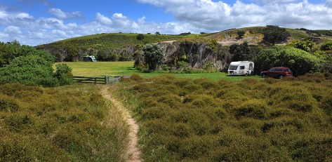 Just behind the sand dunes