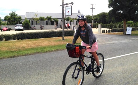 Chloe outside a vineyard on the way.