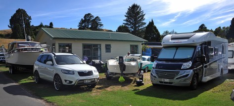 Shawn and Cathy's car on the left with Tim and Pams boat in the middle with Rafe
