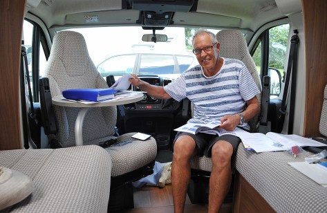 Rob unpacking the sealed manual packs.